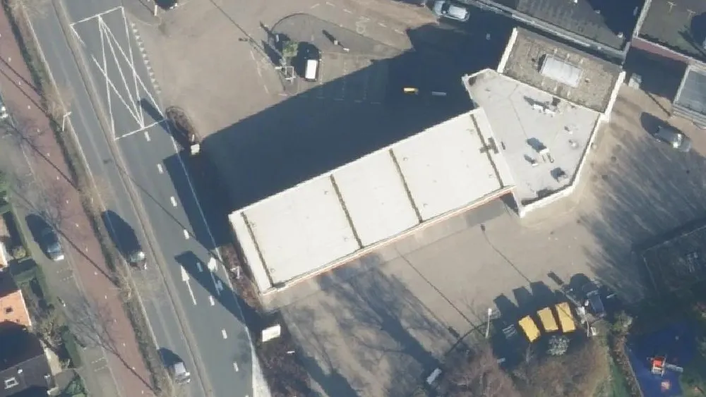 Luchtfoto van de omgeving van Shell Station Wormerveer aan de Plein 13 Nr 6. Nog geen foto's van de locatie zelf.